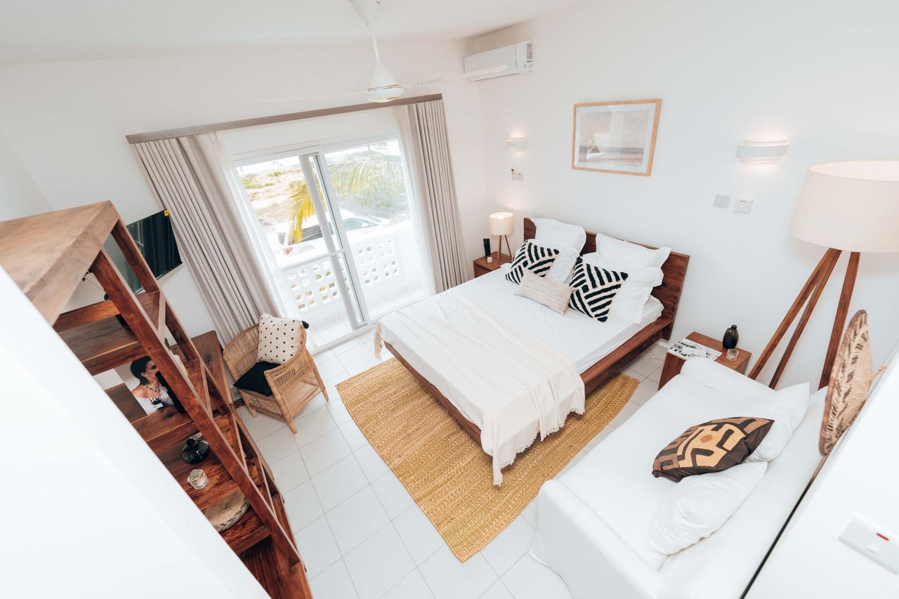 Bright minimalist bedroom interior with contemporary decor in Zanzibar, Tanzania.